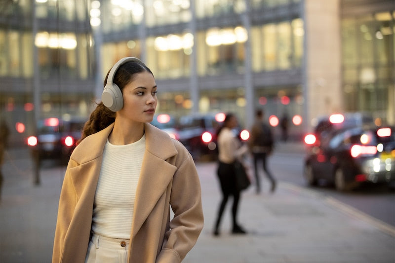 WH-1000XM4 headphones travelling on the street